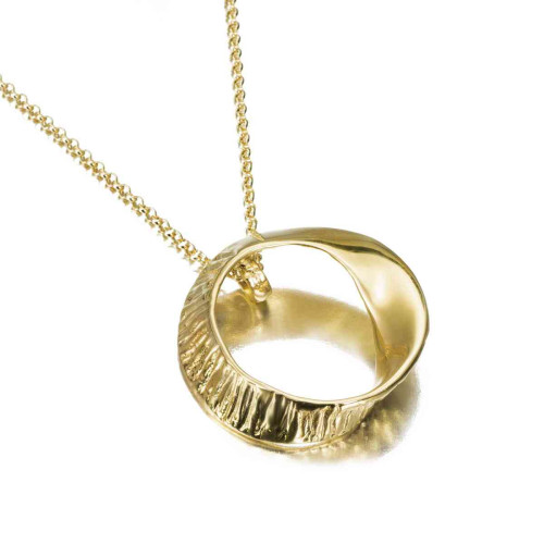 Organic-inspired circular pendant in sterling silver with 18k gold vermeil