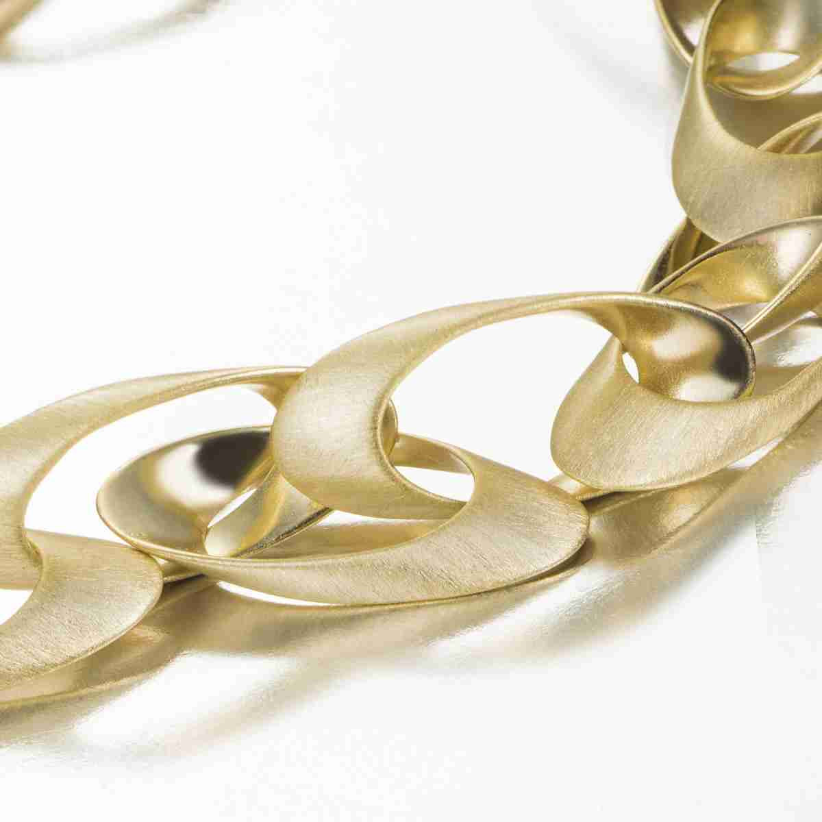 Long necklace with oval pieces in sterling silver with 18k gold vermeil