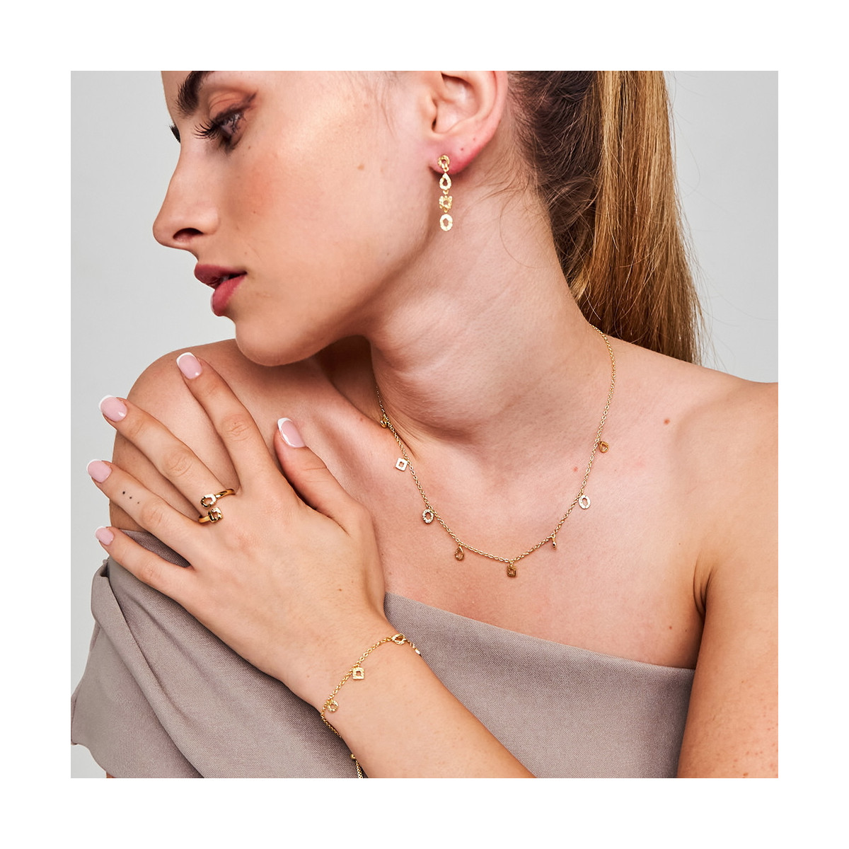 Pulsera geométrica en plata de ley con baño de oro 18k