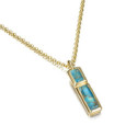 Turquoise pendant with unique cuts in sterling silver with 18k gold vermeil